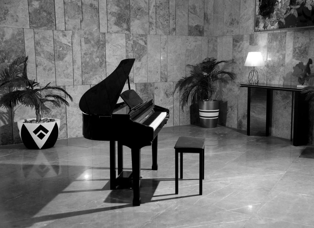 Tolip Resort El Galala Hills Айн-Сохна Екстер'єр фото A piano